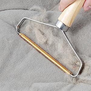 Luddborttagare för Djurhår – Effektiv & Manuell Tygskrapa